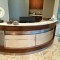 Radius reception desk brown wood stainless steel by hmcwoodwork.com